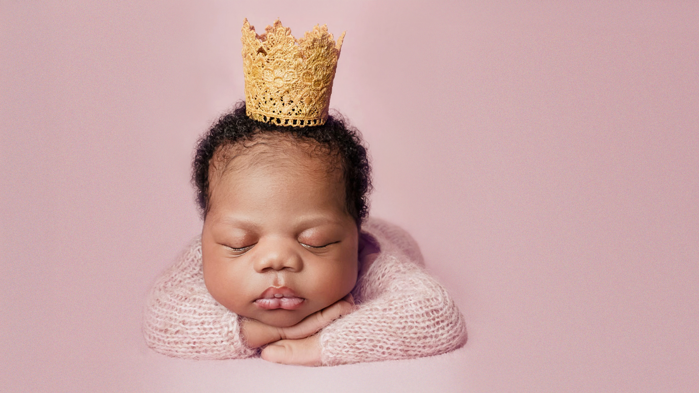 hands on chin pose baby girl pink