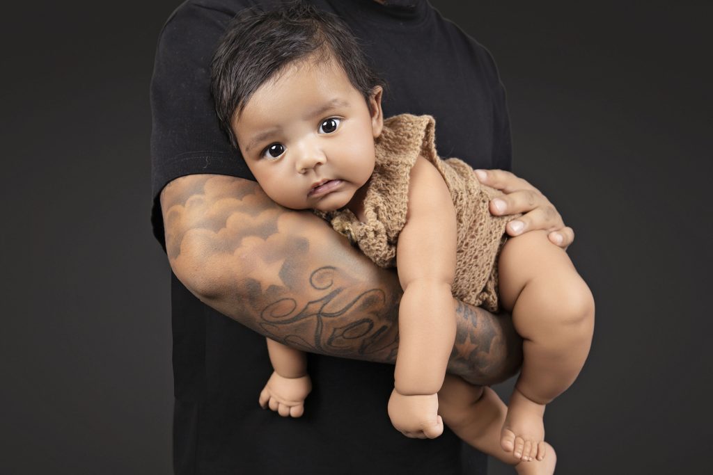 When Is the Best Time for a Newborn Photoshoot in Durban (And What If You Miss It?) 3 Month old baby boy in dad