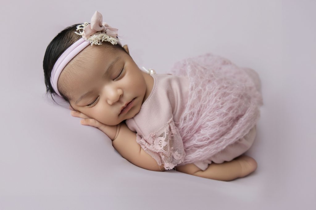 When Is the Best Time for a Newborn Photoshoot in Durban (And What If You Miss It?) Newborn baby girl bum up pose